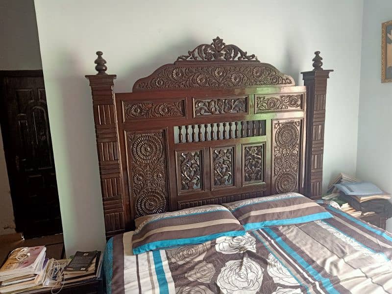 wooden double bed 0