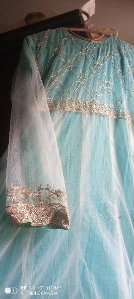 beautiful maxi in ice blue color with embroided dubata n back 8