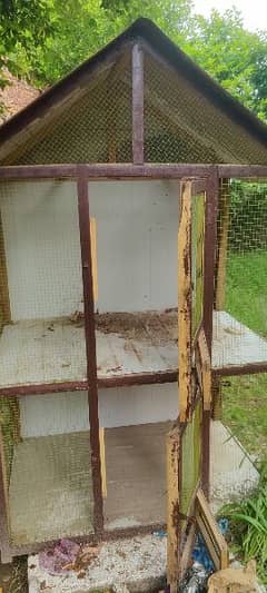 hen and birds iron and wooden cage