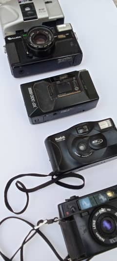 5 ANTIQUE CAMERAS