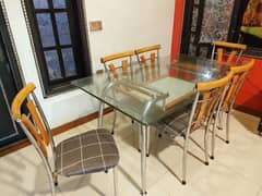 Dining table SS pipe glass top with 6 chairs