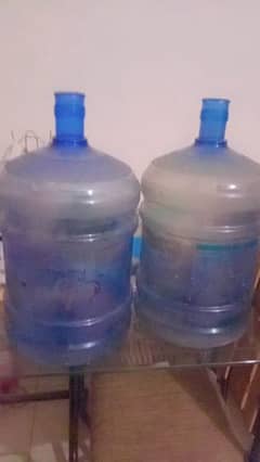 two water dispenser bottles of 17 literes