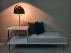 settee with table lamp