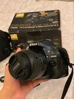 Nikon D5200 with box and all camera accessories and 50mm lens