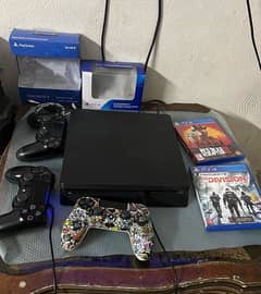 ps4 lush condition with box and  3 controllers and 2 game