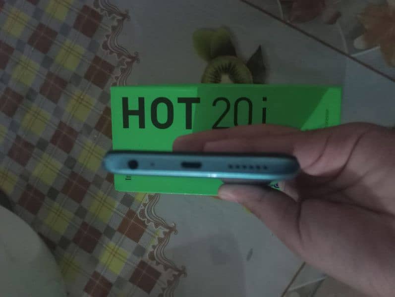 Infinix hot 20 I model  Ram 128gb and storage 4+3gb 7