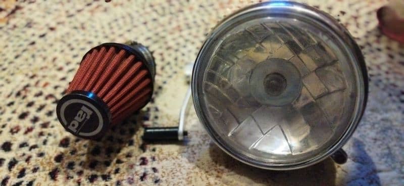 Honda 125 gol head light air filer gear lever 4