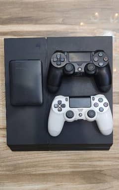 500GB PS4 with Extra 500GB Hard Drive + 2 Controllers