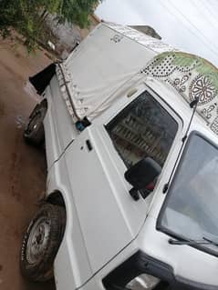 Suzuki Ravi 2001 White Colour with jangla or Tarpal Sides Shower