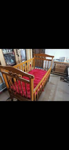 baby cot with baby swing