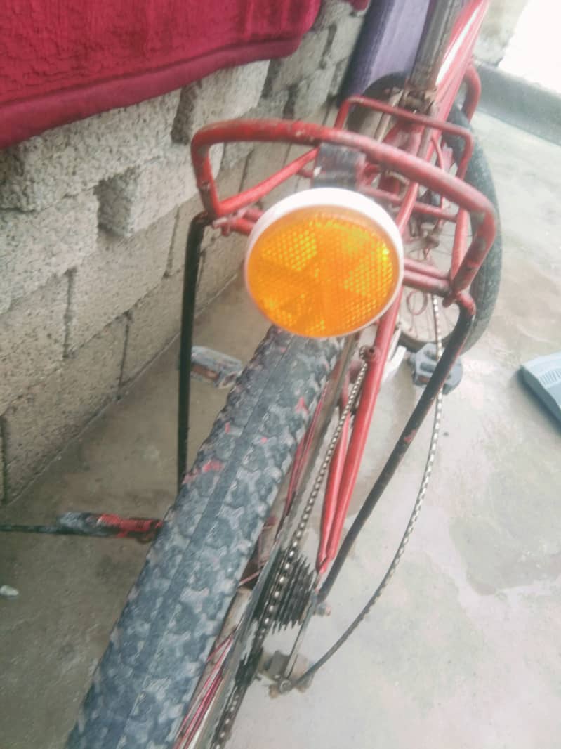 Red geared bicycle for sale 4