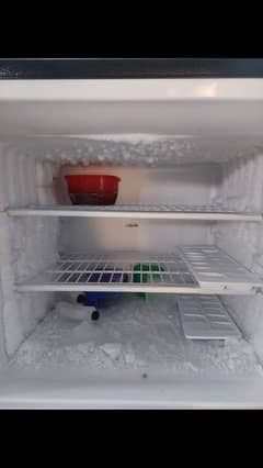 Its a medium size fridge. 10/10 condition with warranty card and slip