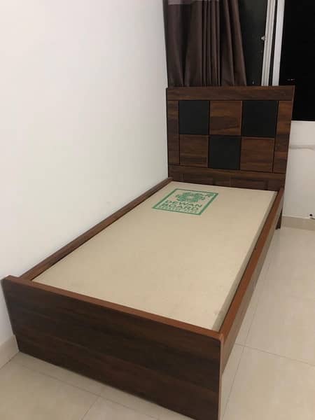 single wooden bed 1