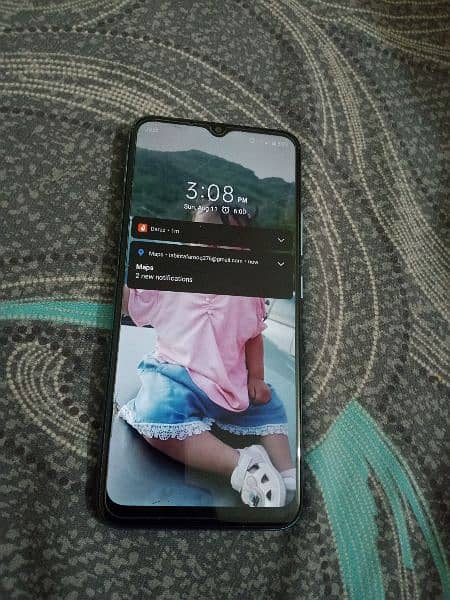 Realme C25y. 6