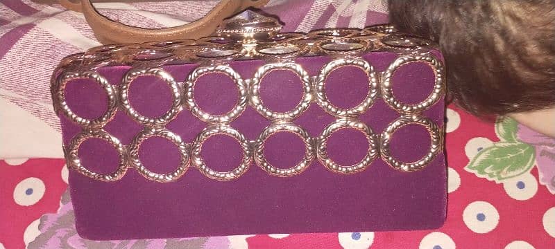 purple colour clutch 0