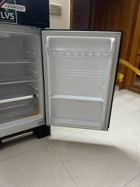 kenwood refrigerator  glass door slightly  used  just 2 month 2