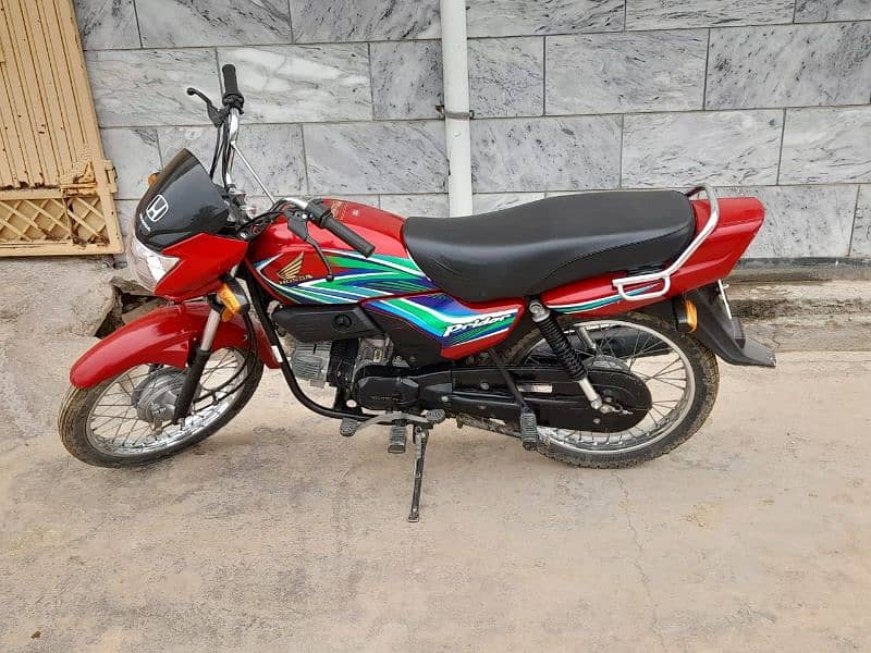 Honda pridor 100 Red clr 1