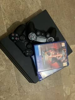 PS4 PRO 1TB US MODEL 2 CONTROLLERS + 3 POPULAR GAMES