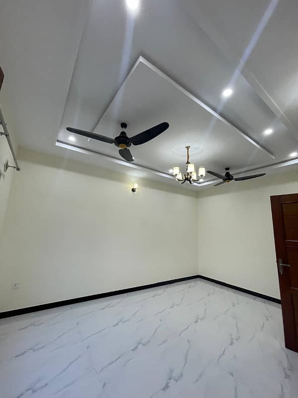 10 Marla Double Unit Brand New House Available. For Sale in Top City in Block A Islamabad. 12