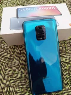 Redmi note 9s 6+2gb ram 128 gb memory back gorilla glass and corning