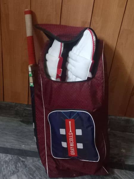 cricket kit with all equipments, bag and Lightweight grey Nicolls bat. 2