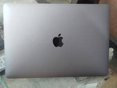 MacBook Pro 2020 core i5 quad core 8gb ram 256ssd touch bar touch id