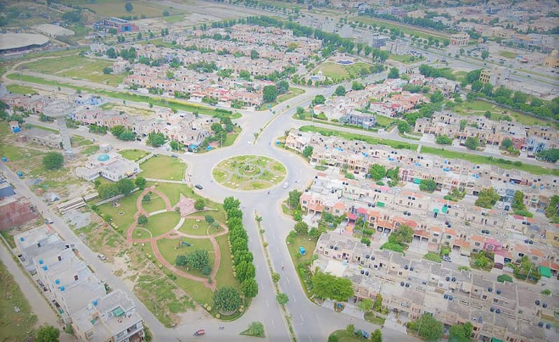 Facing Park 5 Marla Plot For Sale 45 Feet Road M7C2 Lake City Lahore 1