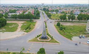 Facing Park 5 Marla Plot For Sale 45 Feet Road M7C2 Lake City Lahore 0