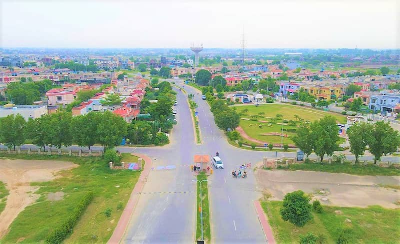 Facing Park 5 Marla Plot For Sale 45 Feet Road M7C2 Lake City Lahore 2