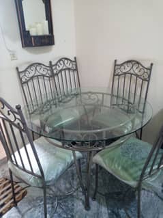 Round dining table with six chairs with 12 mm fine glass iron rod