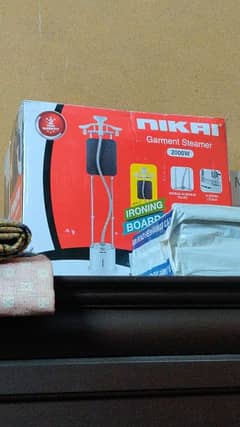 Nikai garment steamer 200w , Iron , Ironing board , Cleaner , Washer,