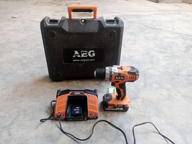 AEG Cordless Drill
 18volt 
made in germany 
1 battery aur 1 charger 1