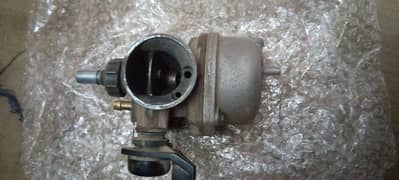 70 bike round carburetor