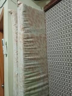 two single mattresses almost new