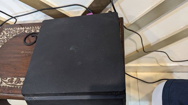 PS4 Slim 1 Tb used with 2 controllers and 2 games 6