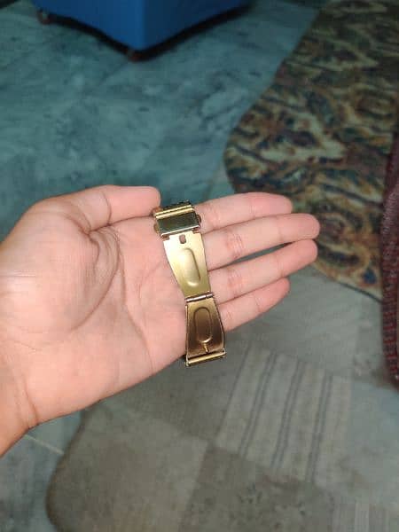 Gold watch 2