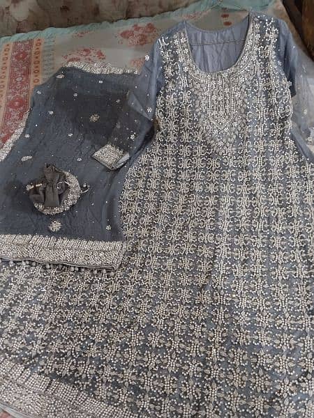 Beautiful Grey colored net Maxi in new condition 1