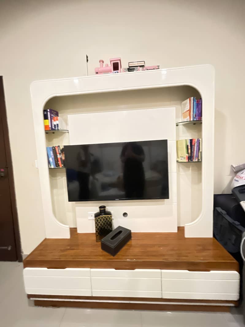 Book shelf and a TV stand in one. Very beautiful and durable. 3