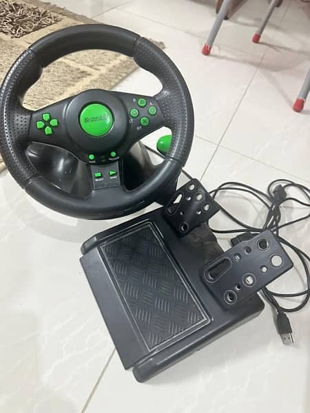 ps3 with games and steering 0