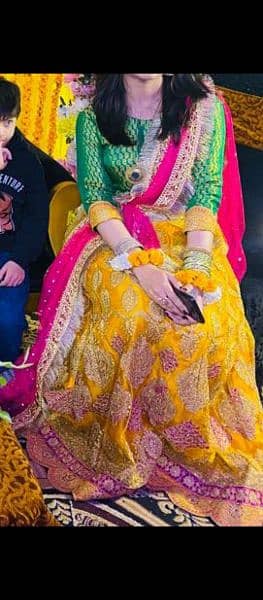 1 wedding lehnga baby pink and 1 mehndi lehnga yellow 4