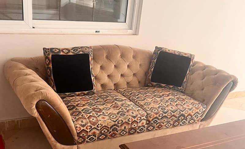 Two seater wooden sofa with cushions for sale 0