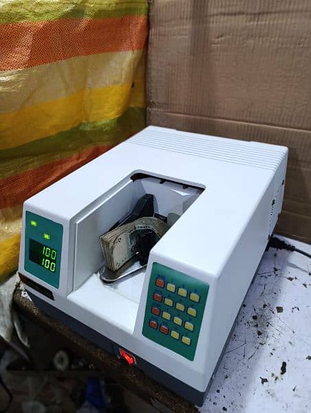 SM Multi currency mix bank cash counting machine, locker Pakistani 19