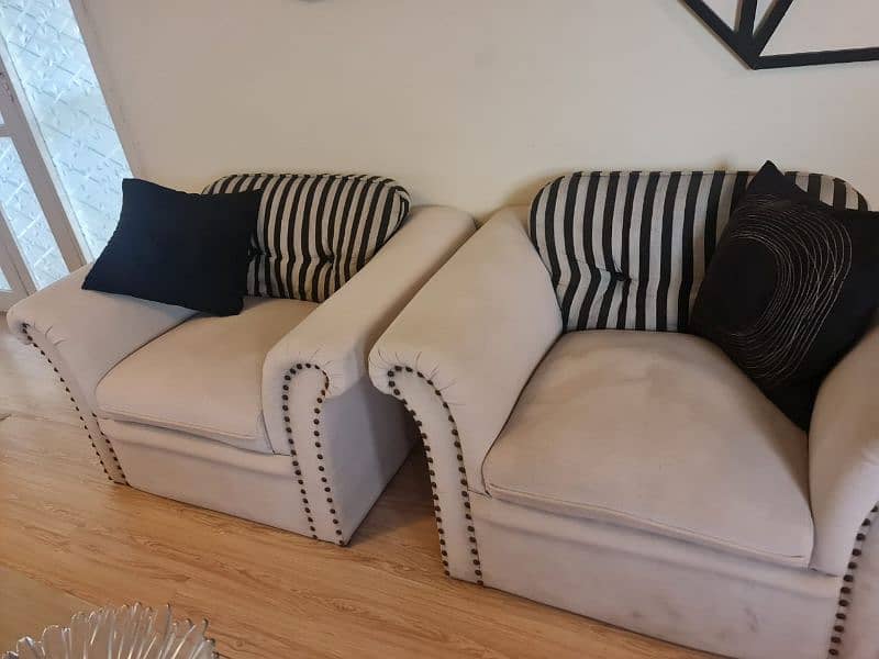 5 seater sofa set with glass top centre table 3