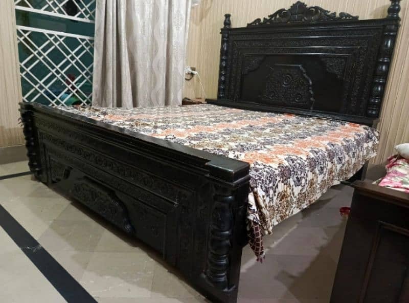 king size bed with two side tables 0