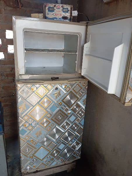 Refrigerator for sale. All parts running genuinely. 2