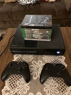 Xbox 1 console with controllers and games