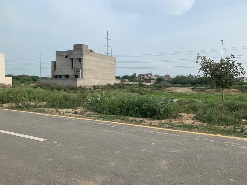 KANAL PAIR PLOTS AT IDEAL LOCATION MAIN 150- FT WIDE ROAD BACK 0