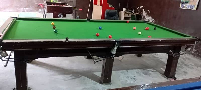 Snooker tables, Video games and Football game 1