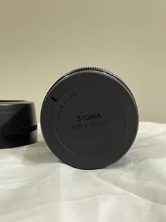 Sigma 30mm f/1.4 in Warranty