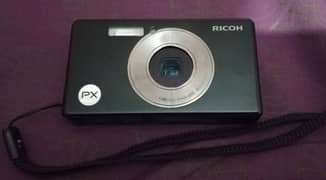 Camera Ricoh and Konica minolta with battery charger 0